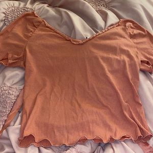 Cute pink blouse, Ties in the back. Size: Xs